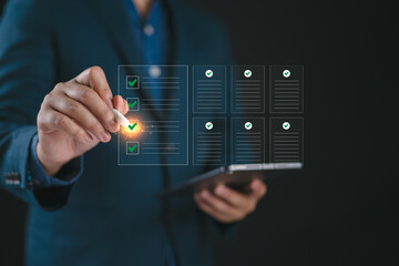 Poster - Businessman puts a check mark in the online document concept of quality control certificate ,inspection ,product warranty ,rules and policies ,terms and conditions , Document verification
