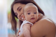 © peopleimages.com - Mom, baby and bonding with portrait in home for affection, playing and support with growth. Comfort, newborn and happy woman in nursery together with security, protection and morning routine for love