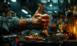 © jambulart - A worker's hand giving a thumbs up.