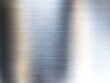 © Rumi43 - Brushed metal background with subtle horizontal texture and gradient light reflection in a smooth industrial surface design