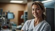 © Mikhail - Friendly female doctor smiling and looking at the patient in a modern medical environment