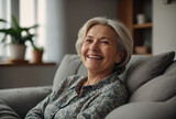 senior woman laughing in her house resting cheerful eldery