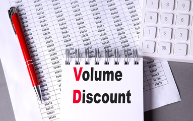 Poster - Volume discount concept with notebook, calculator, red pen, and numerical data on a desk