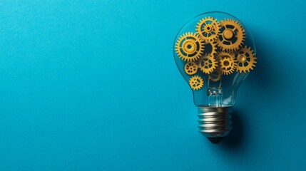 Aufkleber - A light bulb filled with yellow gears against a blue background, symbolizing innovation, creativity, and engineering concepts.
