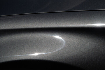 Wall Mural - a car with a shiny silver stripe on the side