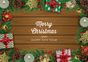 Wall Mural - christmas frame  with gift box, pine branches and decorations on wooden background