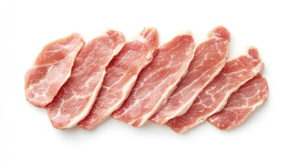 Fresh raw pork slices displayed on a white background viewed from above Ideal for culinary concepts and cooking related themes