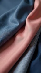 Poster - A blue, pink, and purple fabric is folded and displayed