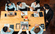 © InfiniteFlow - Top view happy businesspeople in high five gesture and successful efficient teamwork. Diverse race office worker celebrate after made progress on marketing planning in corporate office. Meticulous