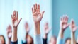 © justjupiter - Hands raised in a group setting, signaling participation and engagement.
