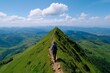 © Thanyarat - A person hiking up a mountain trail, with a stunning view of the landscape below, symbolizing wellness and perseverance