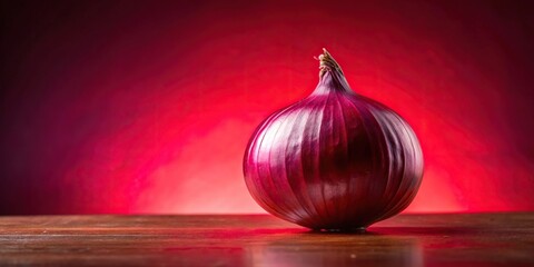 Wall Mural - red onion on red table with pink background