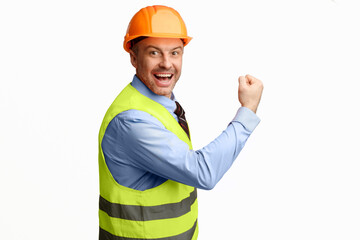 Poster - Building success. Excited builder workman gesturing yes in joy smiling to camera posing over white background. Studio shot