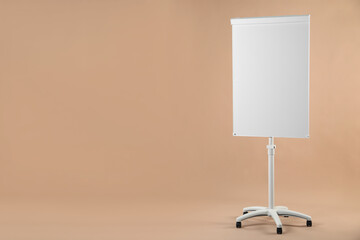 Flip chart on pale brown background. Mockup for design