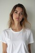 © Phoenix - Girl Wearing White Blank T-Shirt Mockup