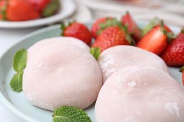 Sticker - Delicious mochi, strawberries and mint on table, closeup