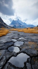 Wall Mural - majestic mountain landscape serenity in nature with reflections in cracked ground and golden grass u