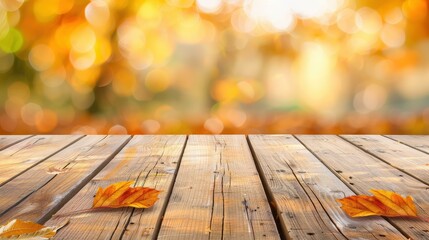 Fototapete - Quaint wooden table top adorned with vibrant autumn leaves, perfect for showcasing seasonal products against a soft backdrop.