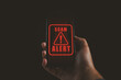 © Nirusmee - Man got scam alert. emergency system hacked alert. scam and cyber security concept.
