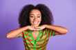 © deagreez - Photo of charming positive woman wear striped shirt arms chin empty space isolated violet color background