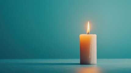 Wall Mural - Candle with flame, symbolizing remembrance and hope