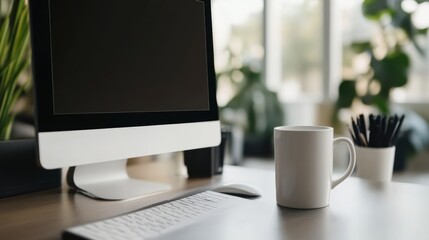 Minimalist Workspace Setup with Computer, Mug, and Keyboard