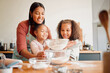 © Abrahams/peopleimages.com - Mother, smile and baking with children in home for help, support and parent teaching to cook. Flour, woman and happy with kids in kitchen for ingredients, preparation and learning recipe on weekend