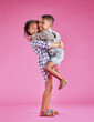 © Siphosethu Fanti/peopleimages.com - Happy, hug and portrait of children in studio for bonding, love and cute relationship. Family, childhood and isolated brother and sister embrace for affection, care or fun together on pink background