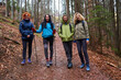 © Xalanx - Women hikers in the forest in a rainy day