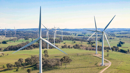 Wall Mural - aerial drone view of an array of large wind turbines at biala and gullen range wind farm, bannister 