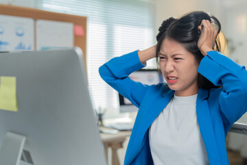 Stressed businesswoman overwhelmed at desk with computer, deadlines, and burnout, highlighting importance of mental health in corporate world