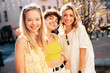 © halayalex - Three young beautiful smiling hipster female in trendy summer stylish clothes. Sexy carefree women posing in the street. Positive models having fun, hugging and going crazy, in sunny day