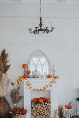 Cozy autumn decor with pumpkins and dried flowers in a bright living room setting