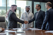 © mattegg - Businessmen shaking hands in a meeting room, a symbol of success and collaboration
