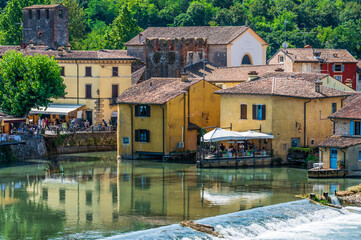 Summer on the Mincio river. Historic village of Borghetto sul Mincio