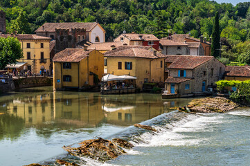 Wall Mural - Summer on the Mincio river. Historic village of Borghetto sul Mincio