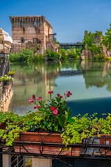 Wall Mural - Summer on the Mincio river. Historic village of Borghetto sul Mincio