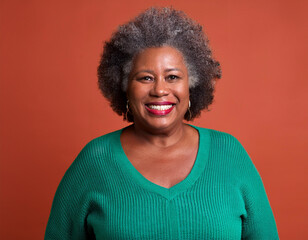 Wall Mural - Studio Portrait of Beautiful Senior Woman Happily Smiling