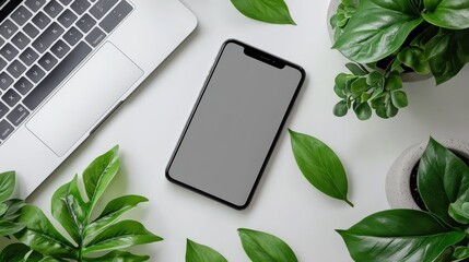 Poster - Simple, modern workspace with a smartphone, notebook, and sleek laptop on a white surface, flooded with natural light.