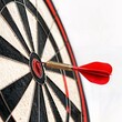 © Inspiraciones - 3d illustration of a dartboard with a red dart stuck in the center. success concept