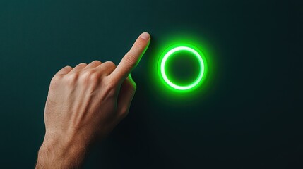 Poster - Hand pressing a glowing green button on a dark background.
