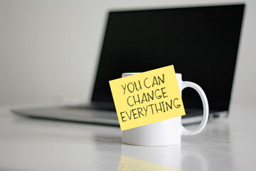 Poster - You Can Change Everything is shown using the text of motivational quote