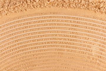 Beautiful texture of dry loose powder in a natural tone. cosmetic abstract background for design. top view. A copy space. layout.