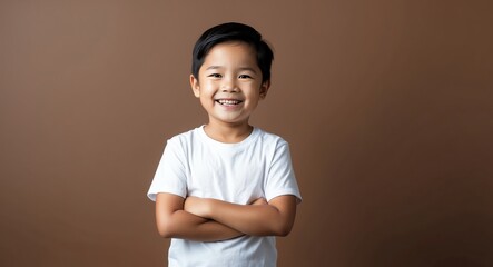 southeast asian kid boy brown background wearing plain white tshirt smiling happy portrait