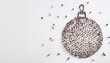 © Marko - Human crowd forming a bauble symbol on white background. Horizontal composition with copy space