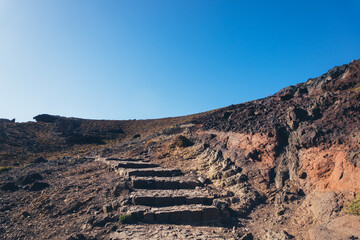 Stone Staircase Leading Upward Through Volcanic Landscape