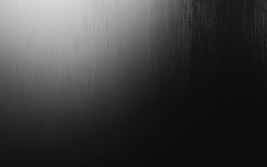 Fototapete - A close-up of a textured black and white surface showcasing smooth gradient transitions in light during a quiet afternoon