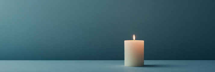 Poster - single candle lit in dark room creates serene atmosphere