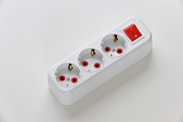 Electric white portable socket on white background