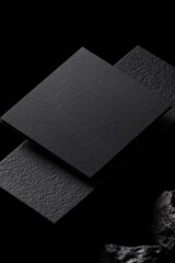 Aufkleber - Abstract black surfaces arranged artistically on dark background with textured elements